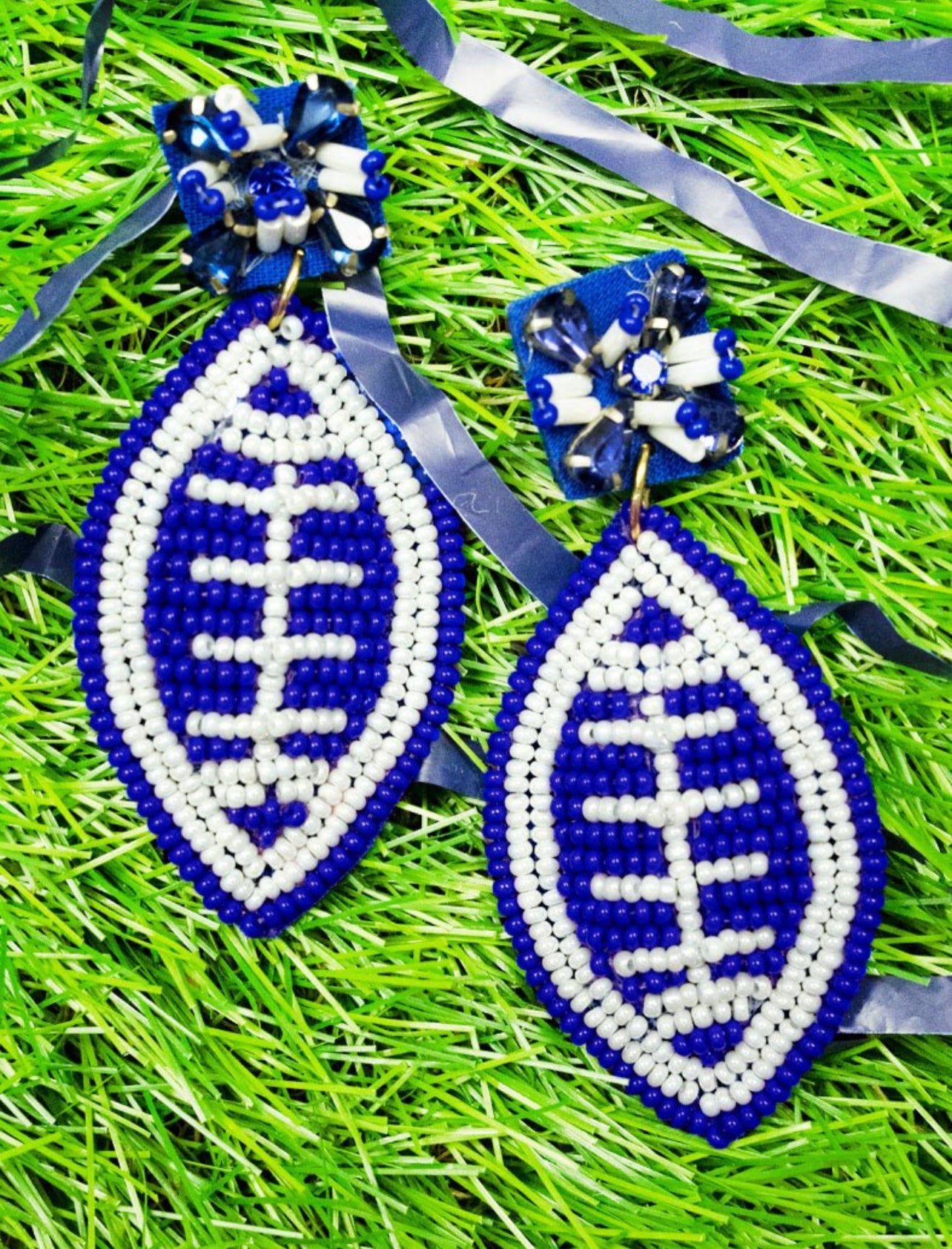 Blue football earringsl