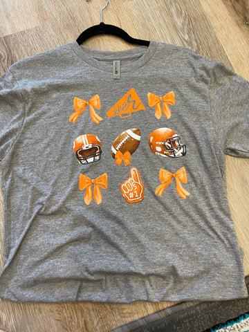 INSTOCK ORANGE BOW FOOTBALL. MEDIUM