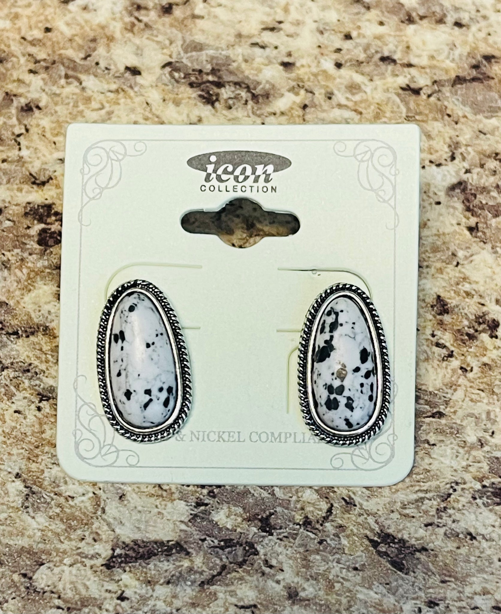 White spotted stud earrings