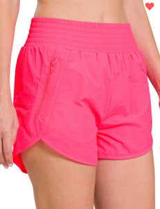 Neon pink athletic shorts